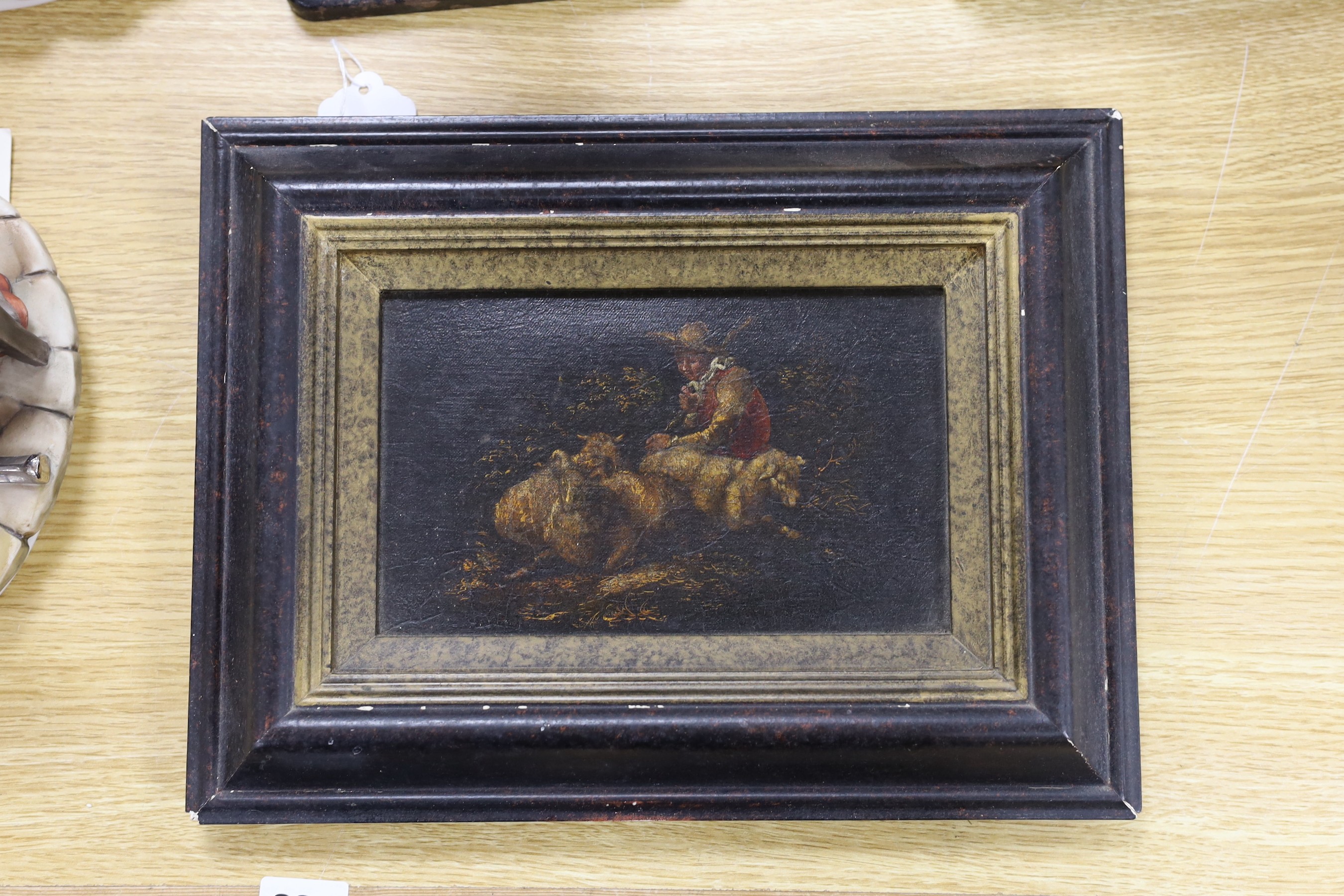 Early 19th century English School, oil on canvas heightened with gilt, Shepherd boy and sheep, 12 x 20cm